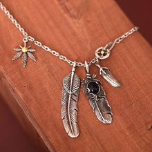 Load image into Gallery viewer, Feather and Hemp Leaf Necklace - Stainless Steel Boho Hippie Jewelry with Blue Stone, Unisex, Durable &amp; Hypoallergenic Special Jewel
